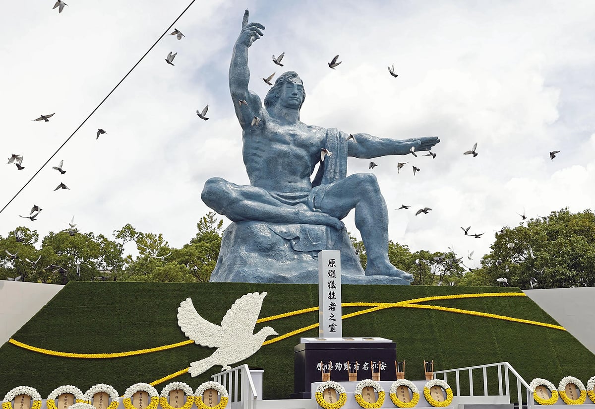 AP : Doves are released into the air during a memorial ceremony at the Peace Park in Nagasaki, Japan, in 2022 |